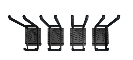 Set of five black guitar capos on a white background